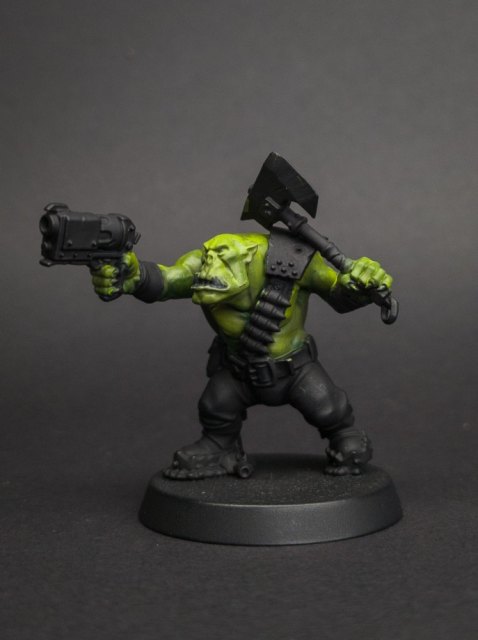 How I paint an Ork, Skin, step 5: The blend: a 50/50 mix of each pair of greens, thinned to a glaze, worked over each join until the layers run into one…
