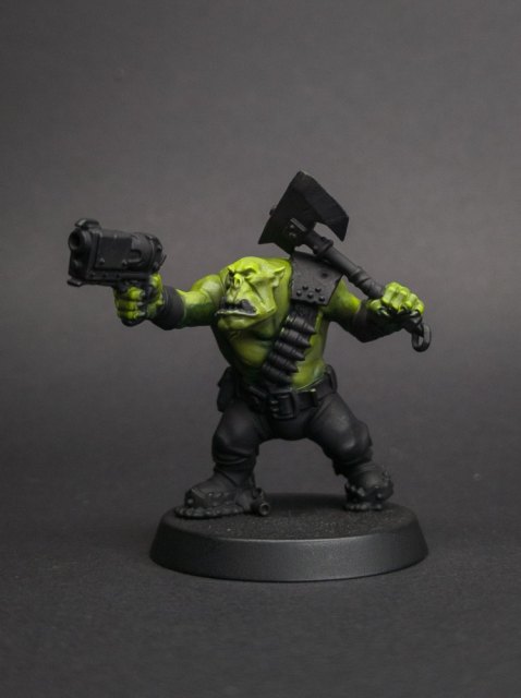 How I paint an Ork, Skin, step 6: One more series of highlights: Yellow Green on the highest 10% of the Lime, the brow, the knuckles and the tops of the…