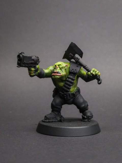 How I paint an Ork, Skin, step 8: Tuskgor Fur thinned 1:4, glazed onto the knuckles, elbows and parts of the face. Then the fingernails, the scars, and…